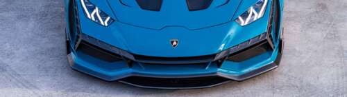 Wysokowydajny supersamochód Lamborghini Huracan Evo, prezentujący swoją aerodynamiczną... Dual UHD