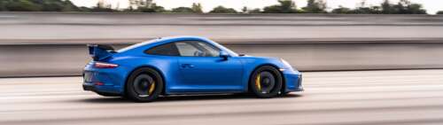 Wysokowydajny samochód sportowy Porsche GT3 RS, charakteryzujący się agresywnym,... Dual UHD