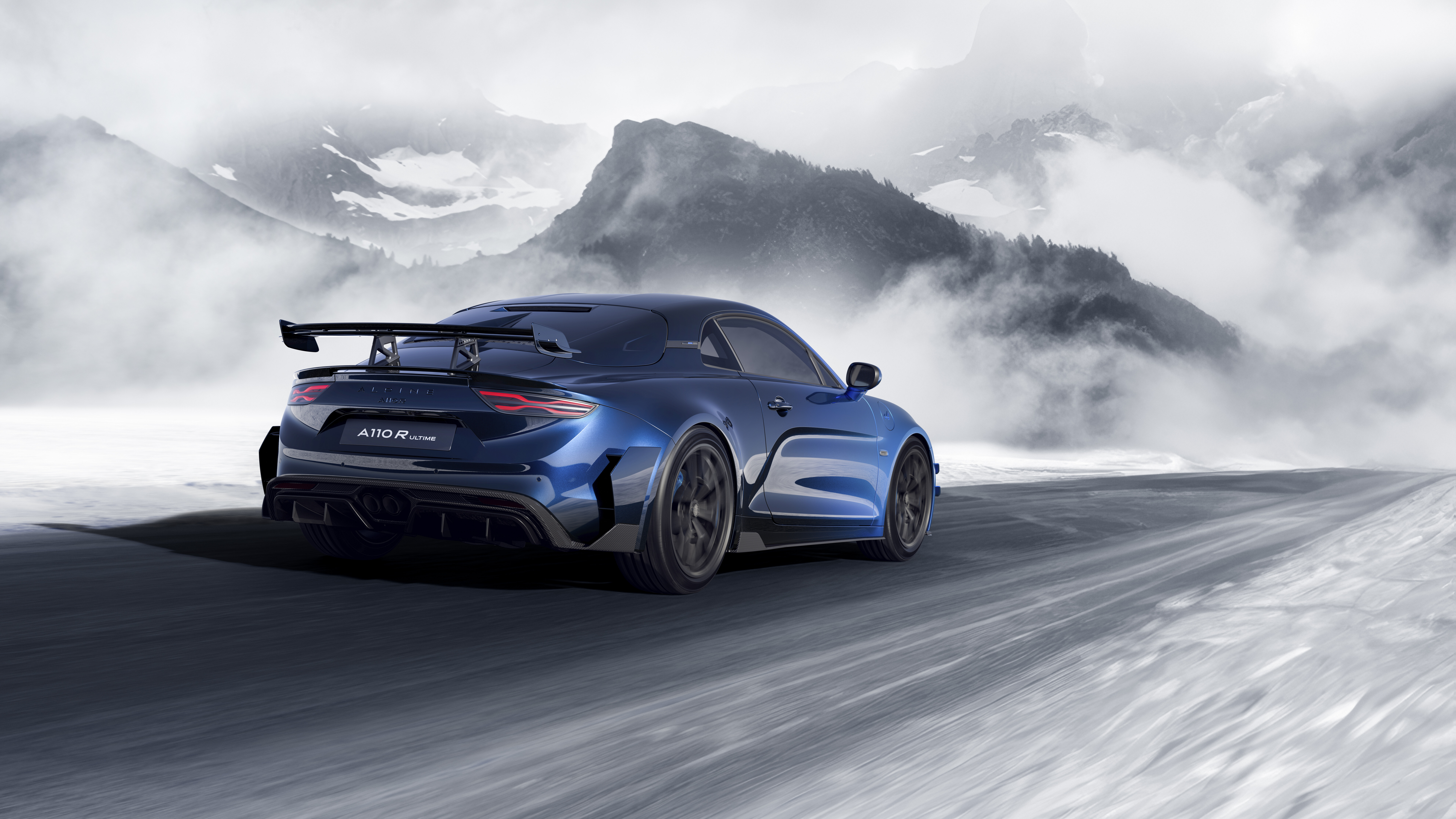 Szczegółowe zdjęcia sportowego samochodu Alpine A110 R Ultime, prezentujące jego aerodynamiczną sylwetkę i wysokiej jakości wykończenie.
